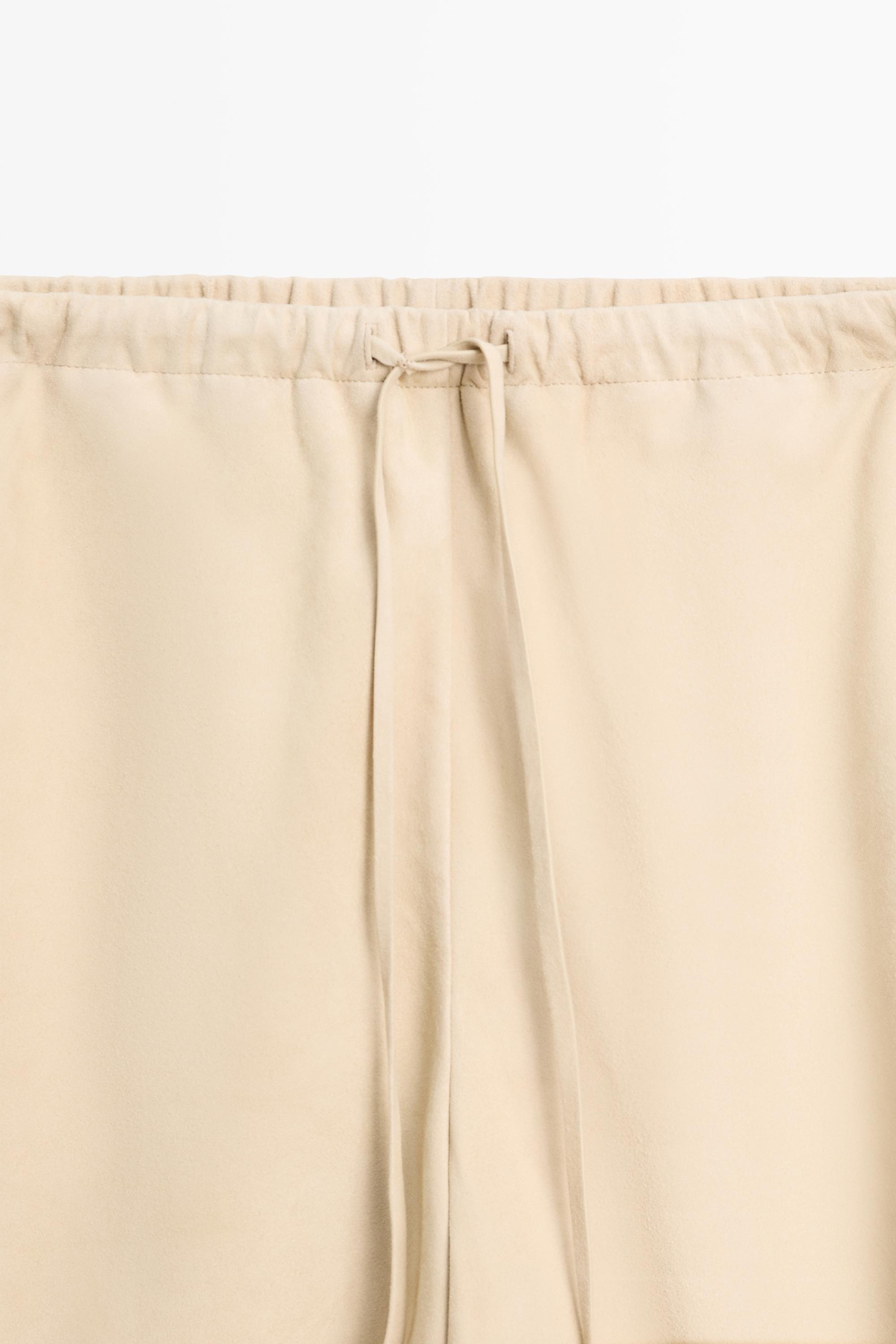 Pantalon bouffant en cuir et daim